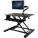 StarTech.com Sit-Stand Desk Converter with Monitor Arm - Up to 26" Monitor - 35" Wide Work Surface - Height Adjustable Standing Desk Converter - BNDSTSLGSLIM